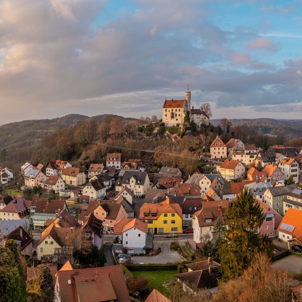 a group of houses on a hill
