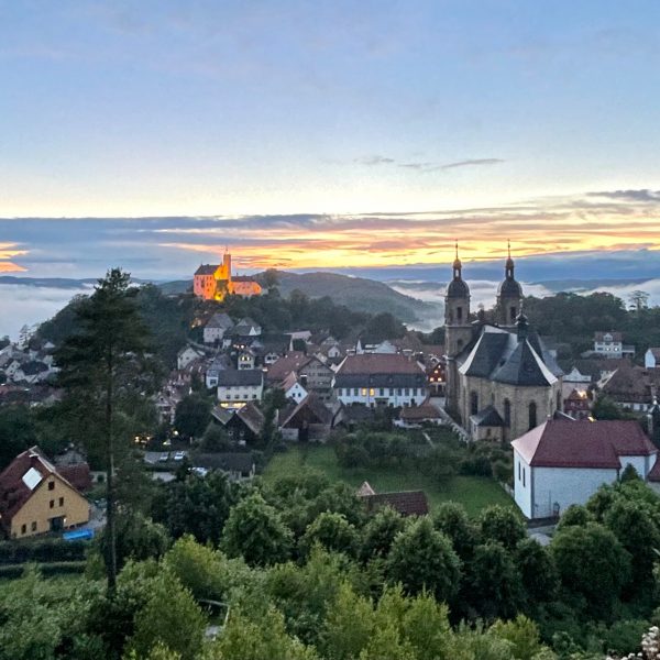 a town with a church and trees